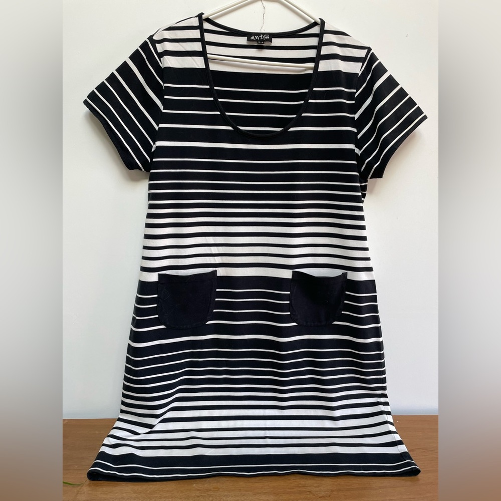 Black and white striped t-shirt dress with front patch pockets.